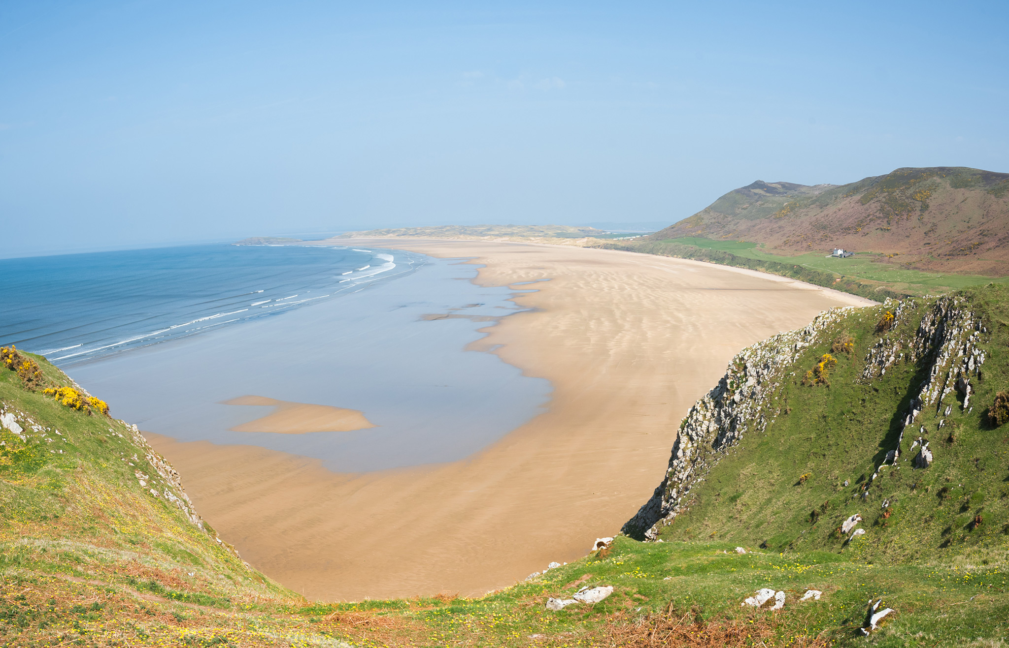 Rhossili Bay on the Gower Peninsula at sunset